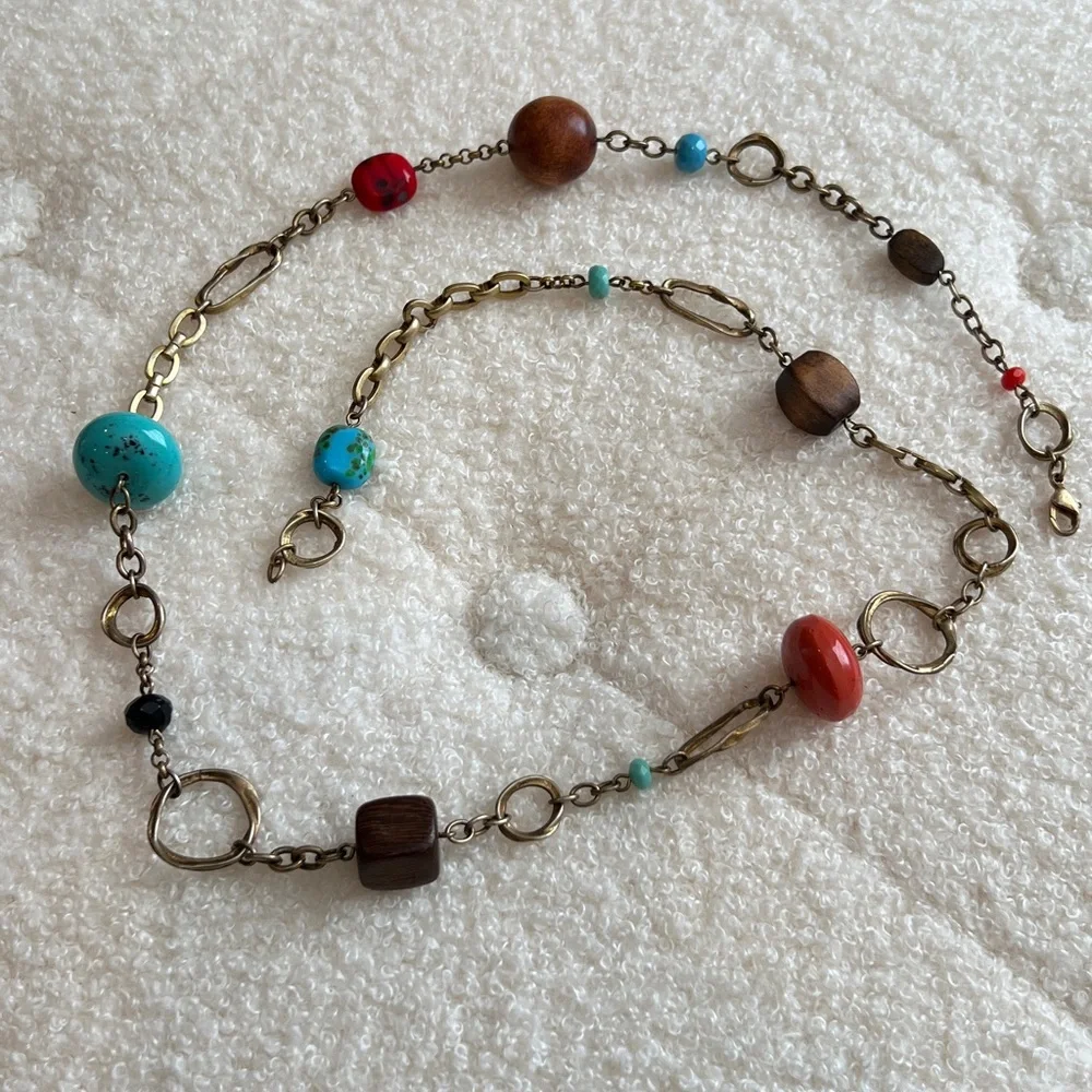 Multi colored beads on a Gold  chain w/ earrings